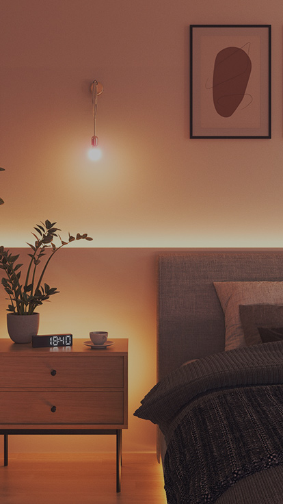 This is an image of a Nanoleaf Essentials Bulb in a bedroom. The light fixture is on the wall in between the bed and nightstand and makes it the perfect bedroom light to set the ideal ambience.